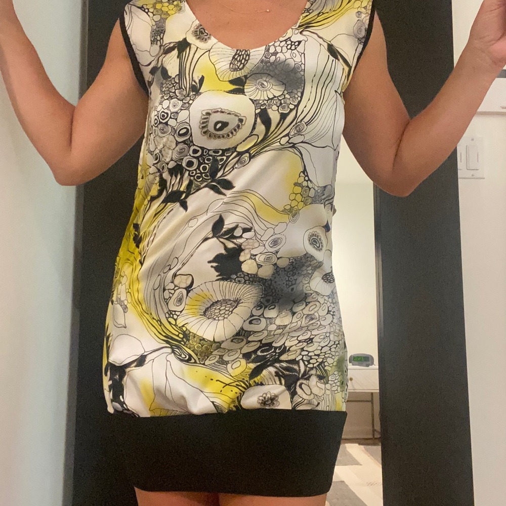Yellow, black and white dress.